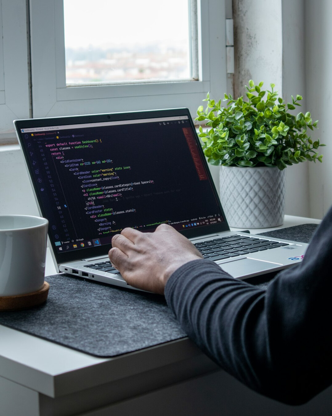 person learning programming on computer