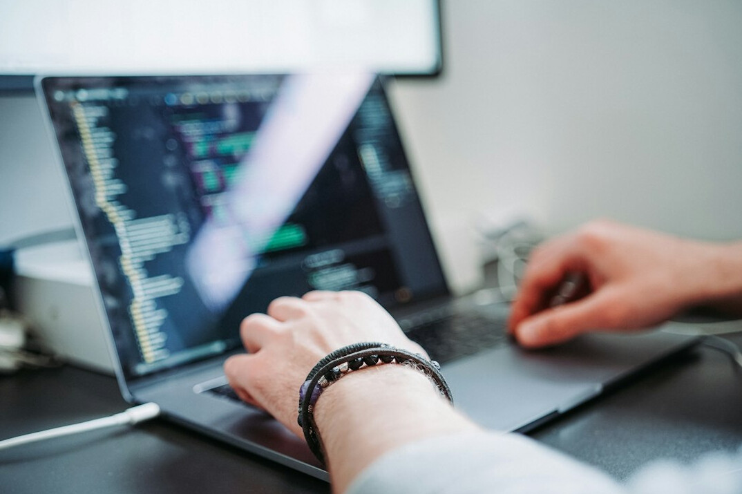 person learning programming on computer