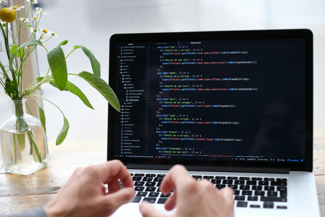 beginner learning programming on laptop